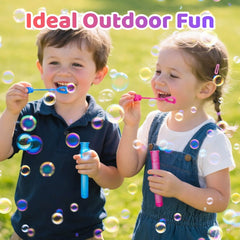 Two young children blowing bubbles outdoors with mini bubble wands, kids party activity and favour.