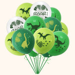 Green and white dinosaur party balloons with footprint and leaf prints