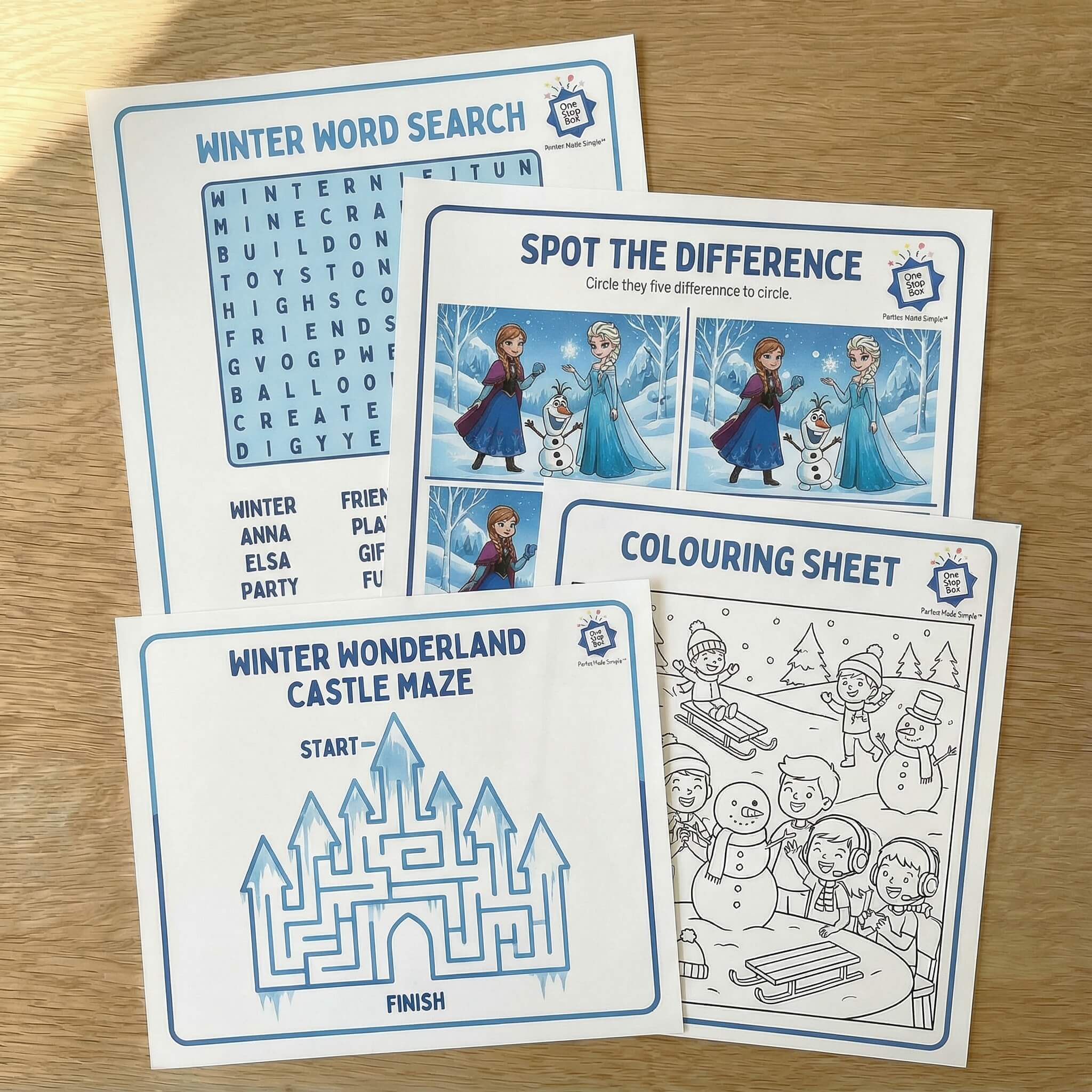 Set of Frozen-themed activity sheets for kids party on a wooden surface