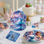 Table setting with Frozen-themed plates, cups, napkins and a cake on a white tablecloth.