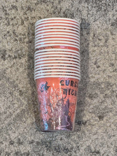 Orange Halloween paper cups with scary party designs