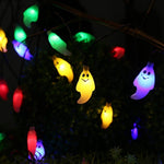 10m LED ghost string lights Halloween decoration with multiple colours and remote, hung on a tree