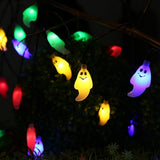 10m LED ghost string lights Halloween decoration with multiple colours and remote, hung on a tree