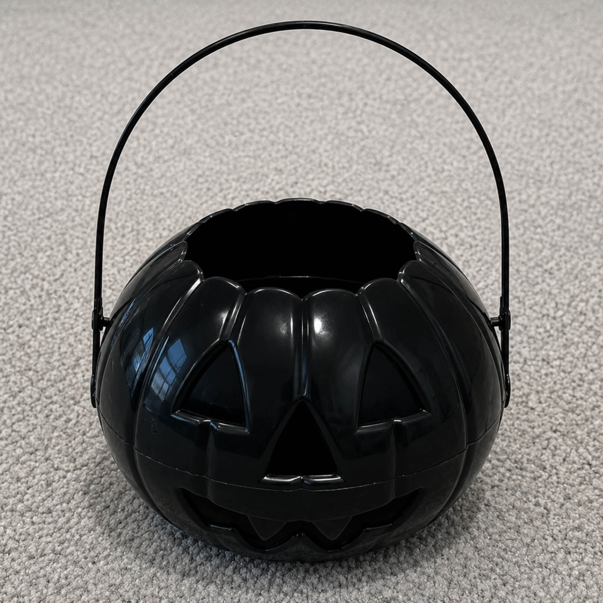 Black Halloween trick-or-treat candy bucket