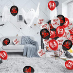 Blood-splatter print Halloween party balloons, in a living room setting