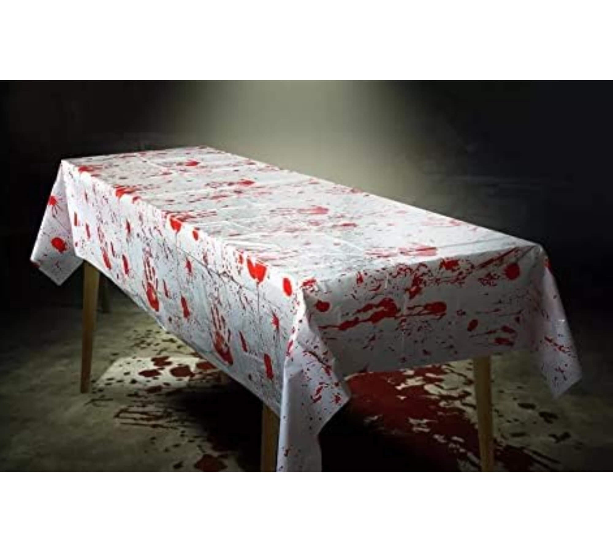Blood-splatter print Halloween party tablecloth, room setting
