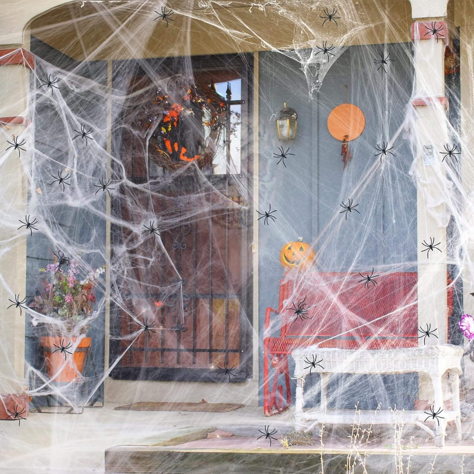 White stretchable Halloween spider web cobweb decoration, on a doorway