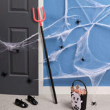 Devil pitchfork trident Halloween costume prop, styled scene