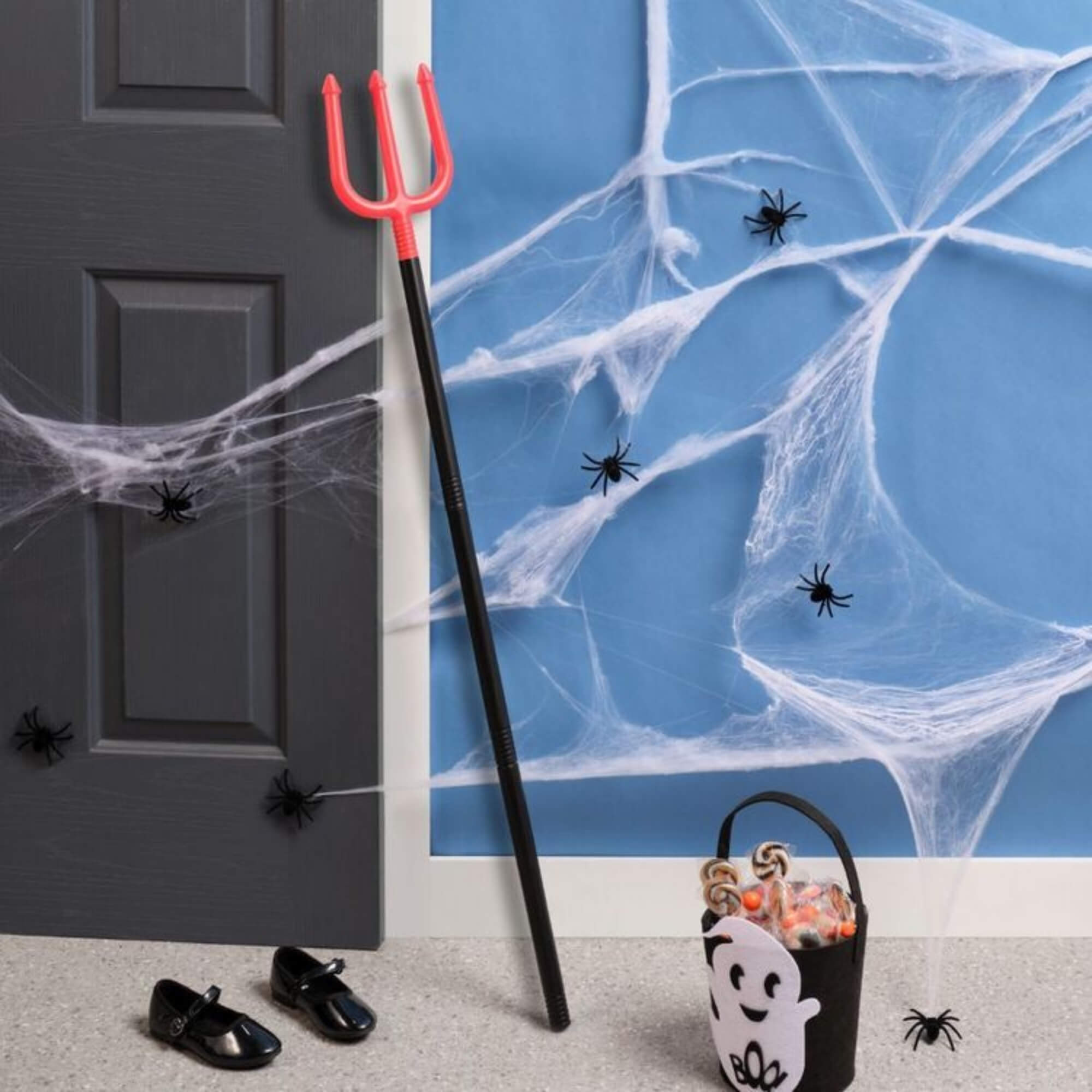 Devil pitchfork trident Halloween costume prop, styled scene