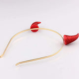 Devil horn headband Halloween costume accessory, flat lay