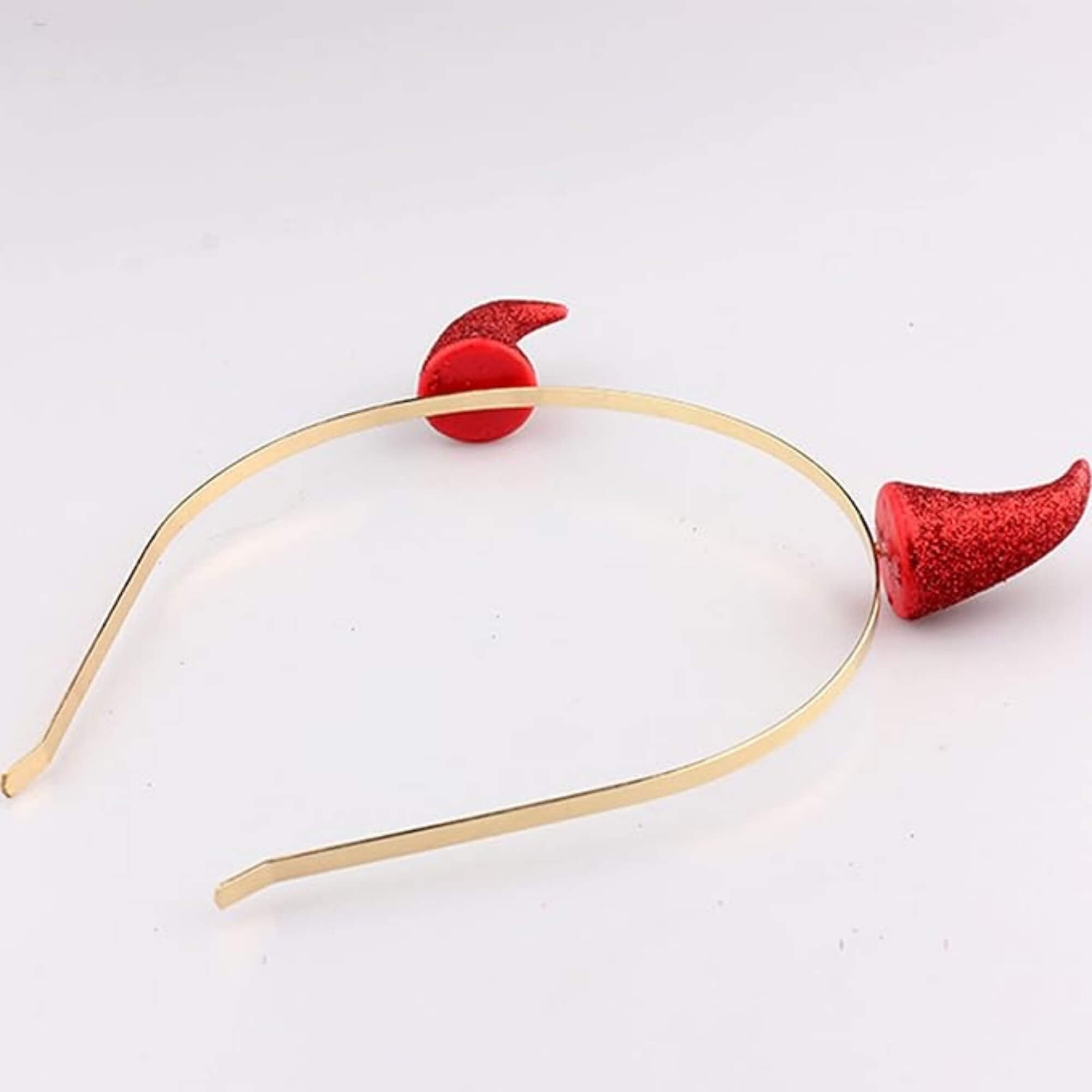 Devil horn headband Halloween costume accessory, flat lay