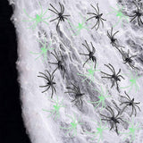 Glow-in-the-dark Halloween spider web cobweb decoration, with spiders
