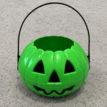Green Halloween trick-or-treat candy bucket