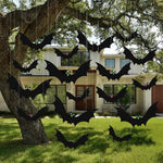 Hanging bat Halloween decoration, hung on a tree