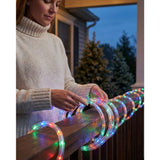 Outdoor Halloween fairy string lights, on a banister