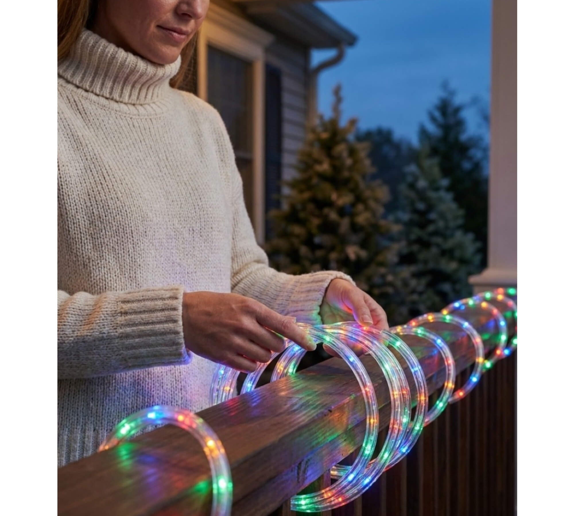 Outdoor Halloween fairy string lights, on a banister