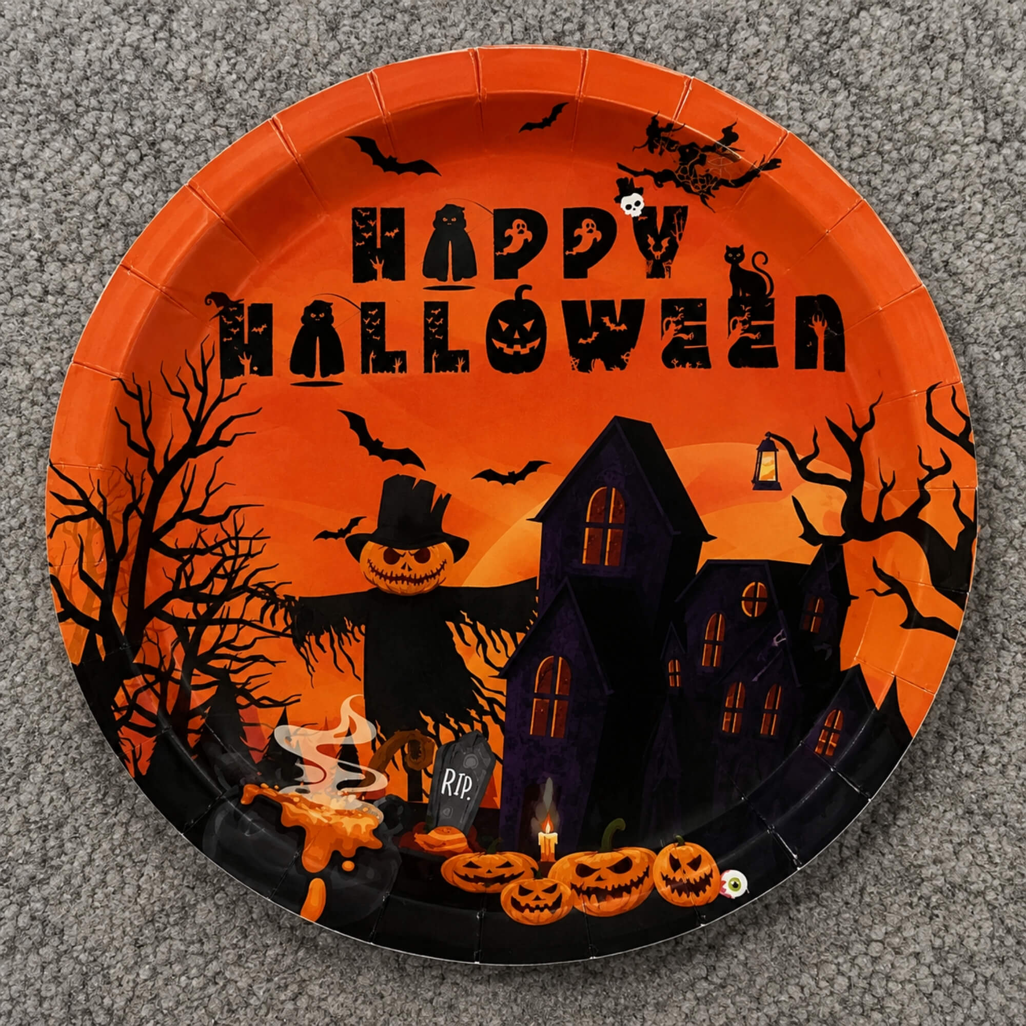 Halloween paper party plate, on carpet