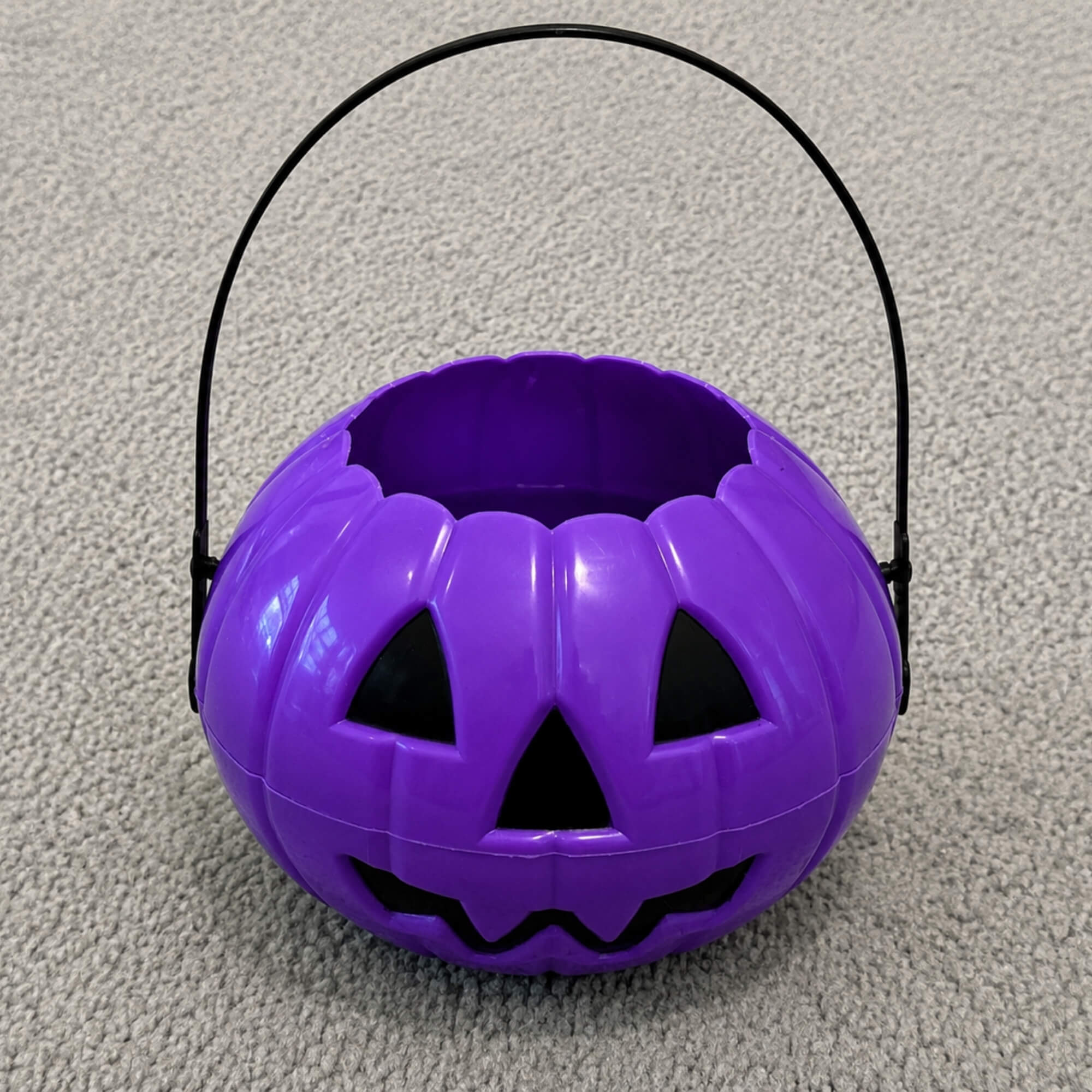 Purple Halloween trick-or-treat candy bucket