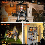 Animatronic skeleton in hanging cage Halloween decoration, in use