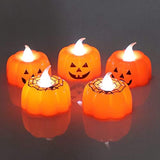 Small orange pumpkin LED tealight candle Halloween decoration