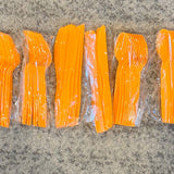 Reusable orange Halloween cutlery with spoons, forks, and knives