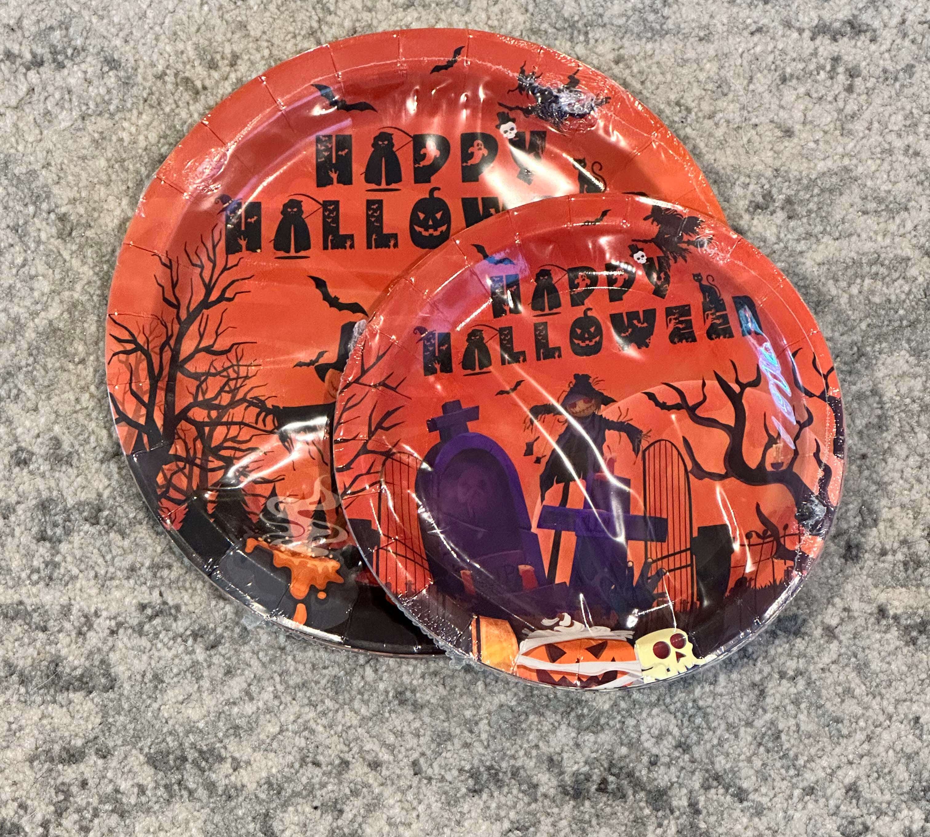 Halloween-themed small and large plates with spooky designs