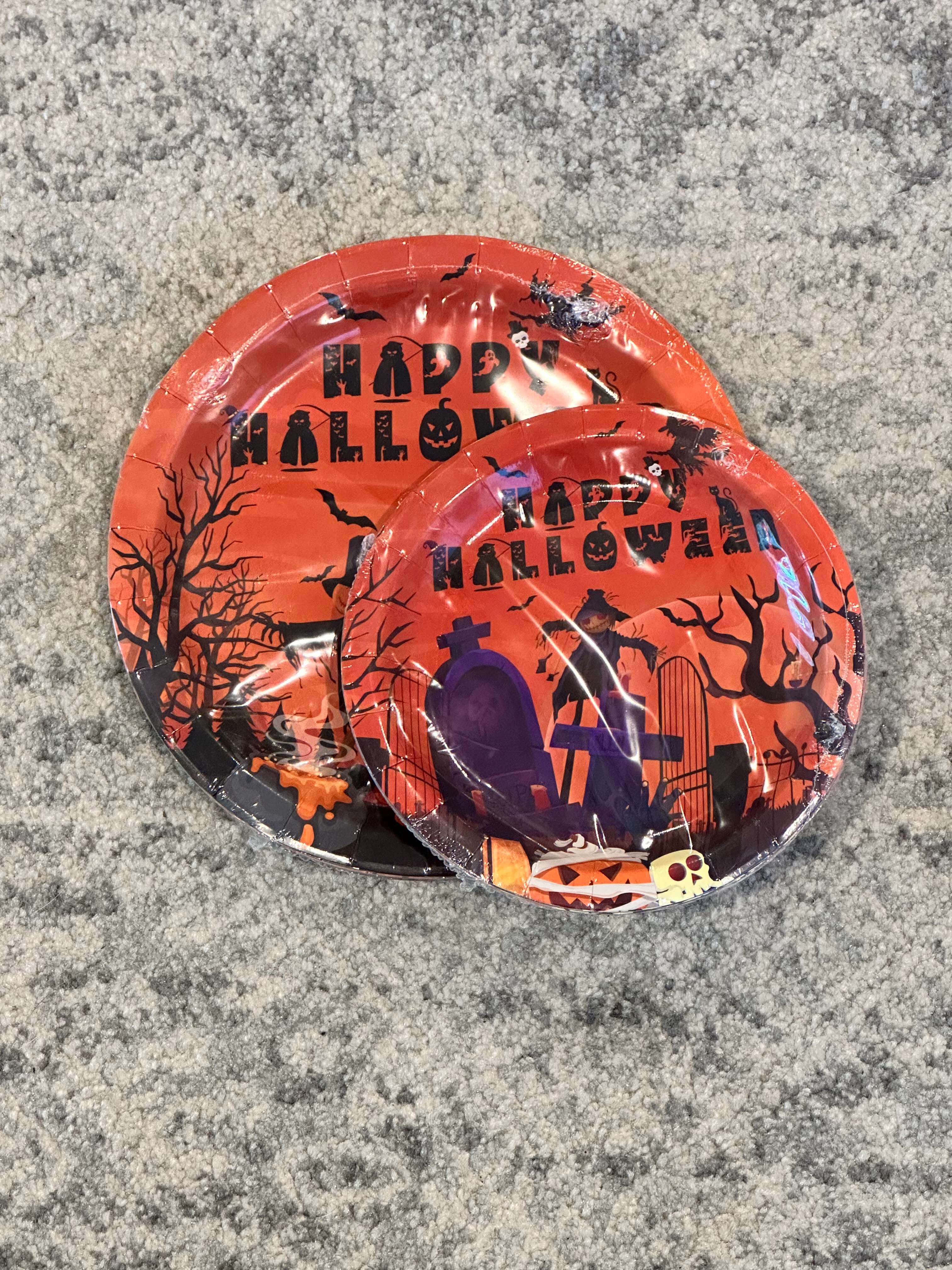 Halloween-themed small and large plates with spooky designs