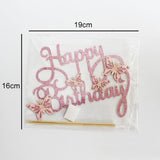 Pink 'Happy Birthday' cake topper with butterfly designs in a clear package, showing dimensions.