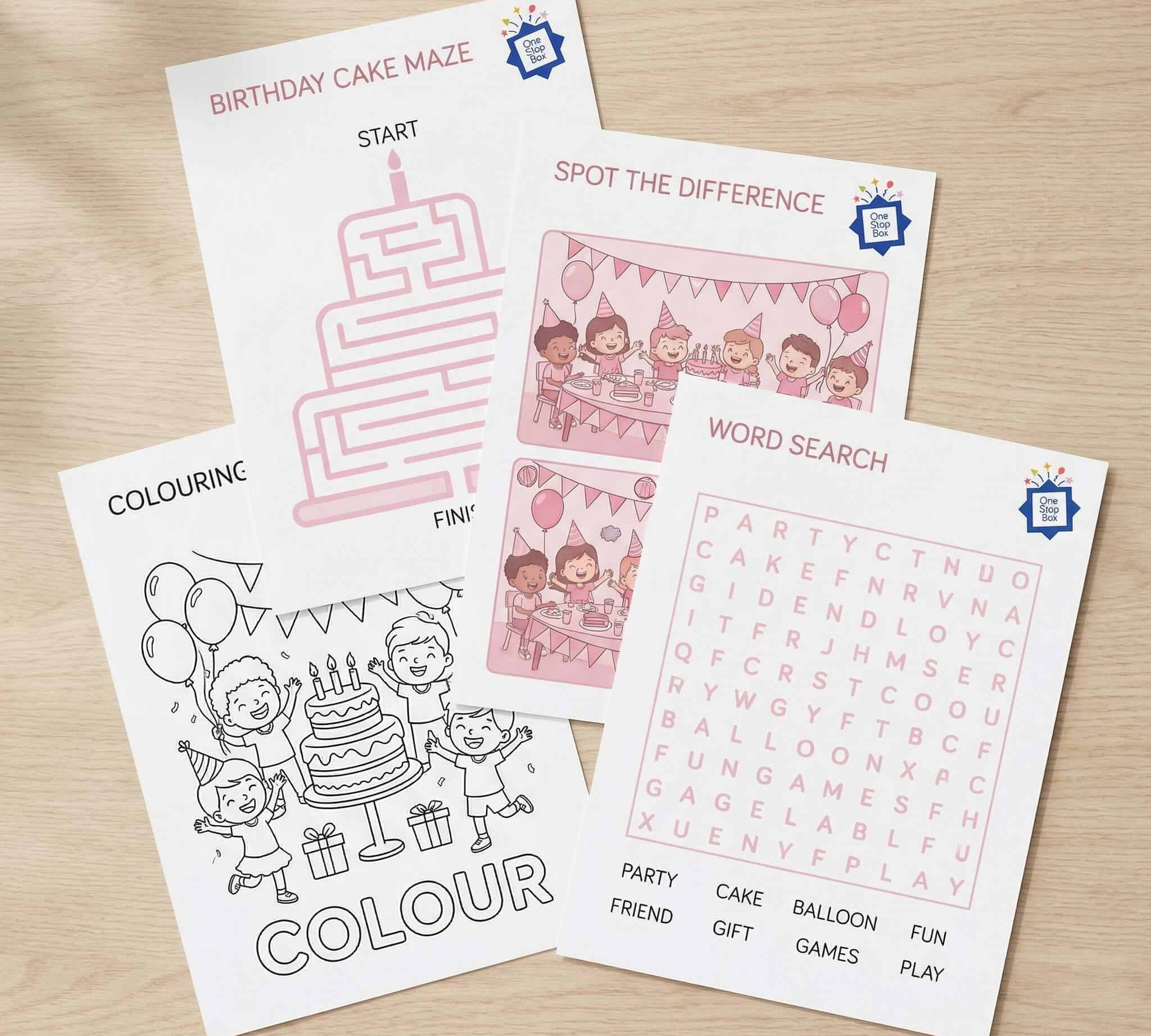 Pink themed birthday party activity sheets on a wooden surface