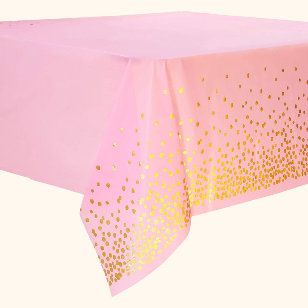 Pink party table cover with gold foil polka dot design