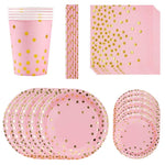 Pink party tableware set with plates, cups, and napkins for kids' birthday
