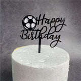 Sports-themed cake topper with ball design